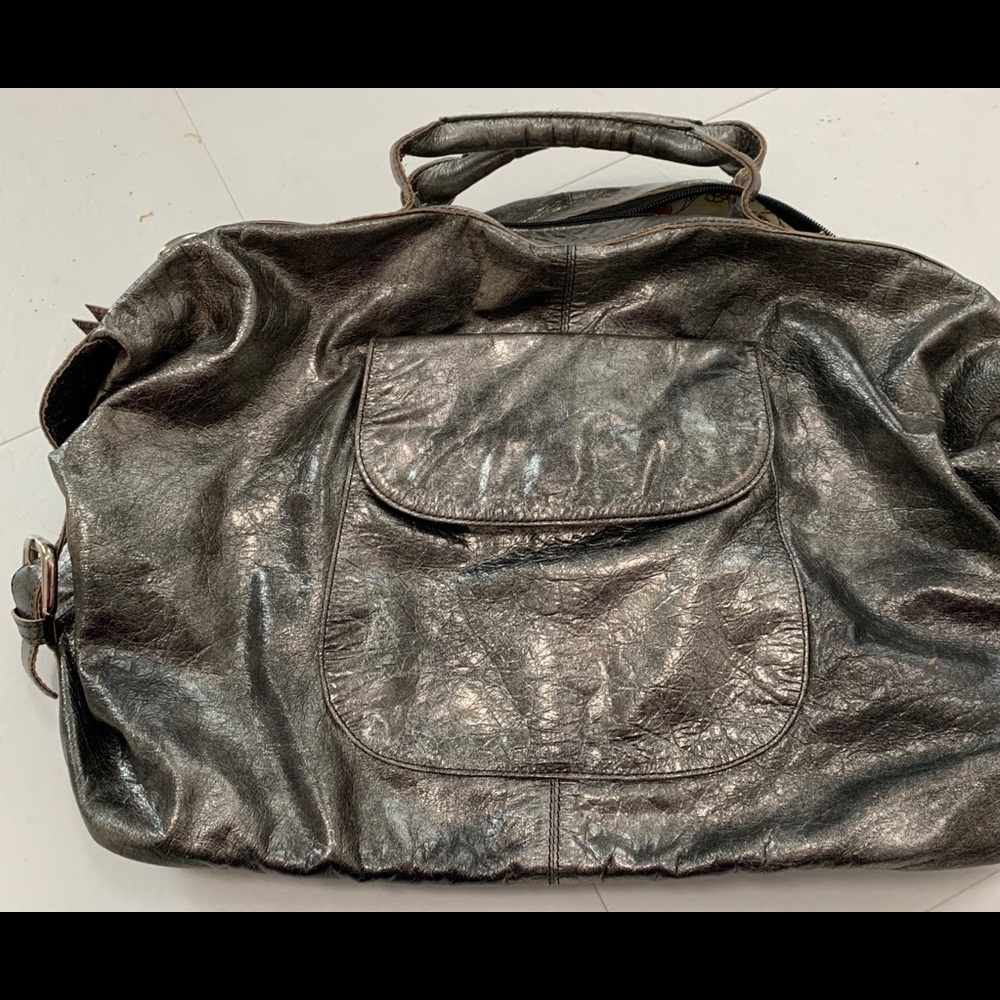 Latico gold & Black Metallic handbag.